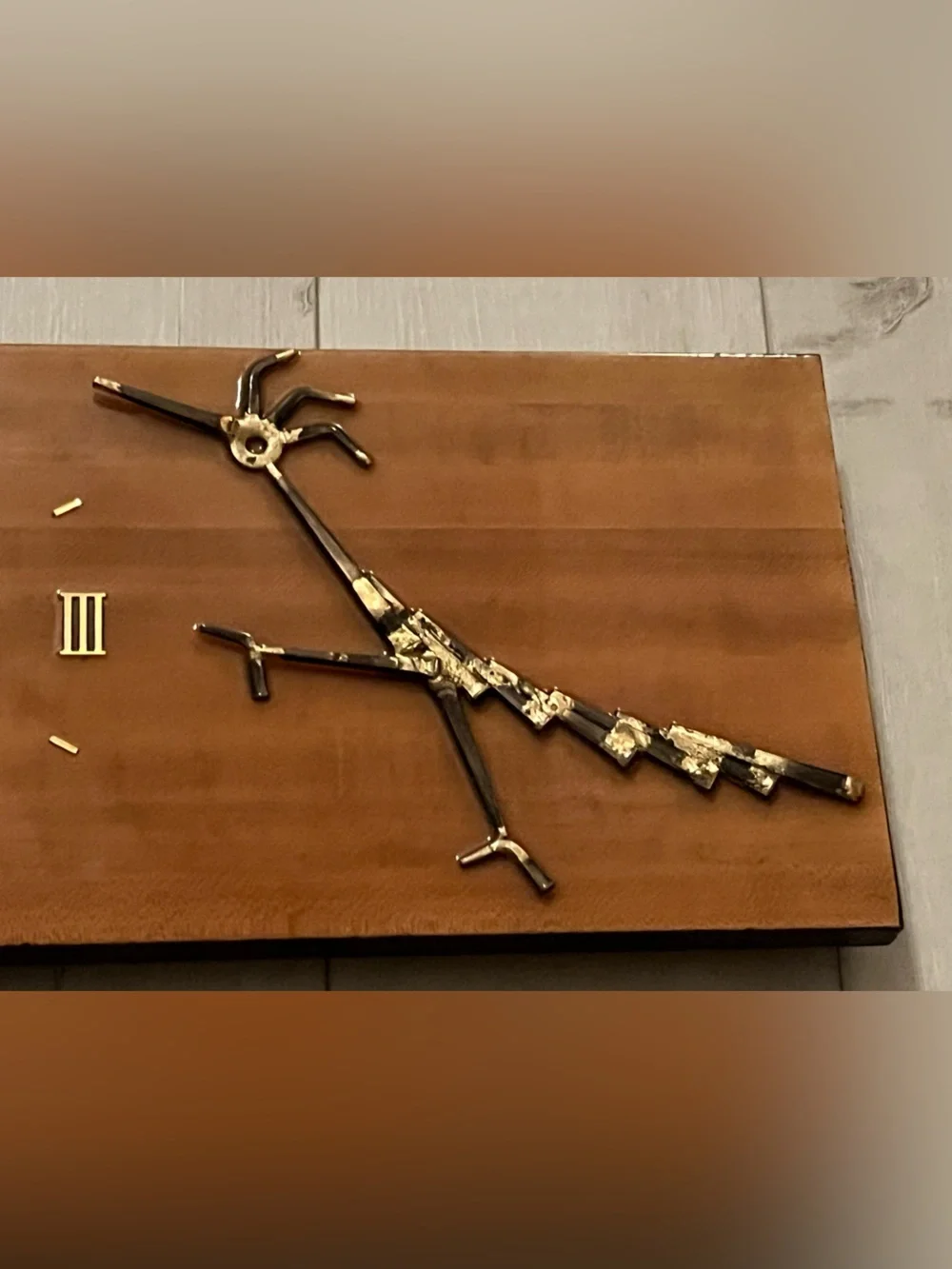 Brown Wood Wall Clock with Gold Metal toad runner